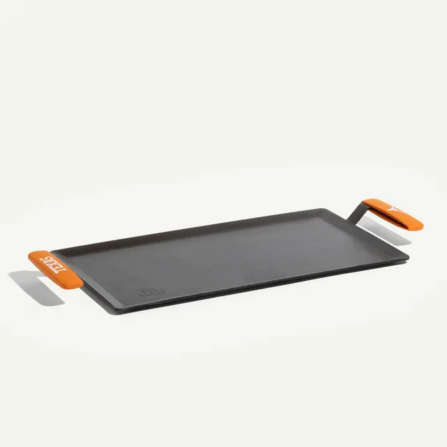 made-in-carbon-steel-griddle-with-university-of-texas-longhorns-silicone-handle- image 1