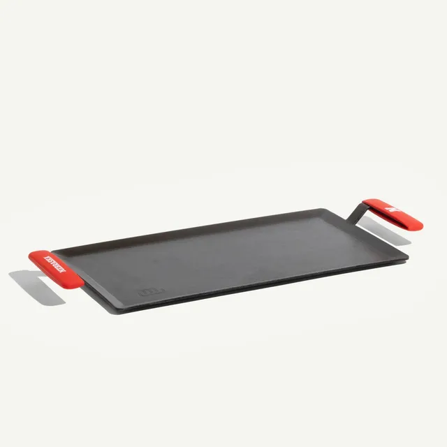 made-in-carbon-steel-griddle-with-university-of-nebraska-cornhuskers-silicone-ha image 1