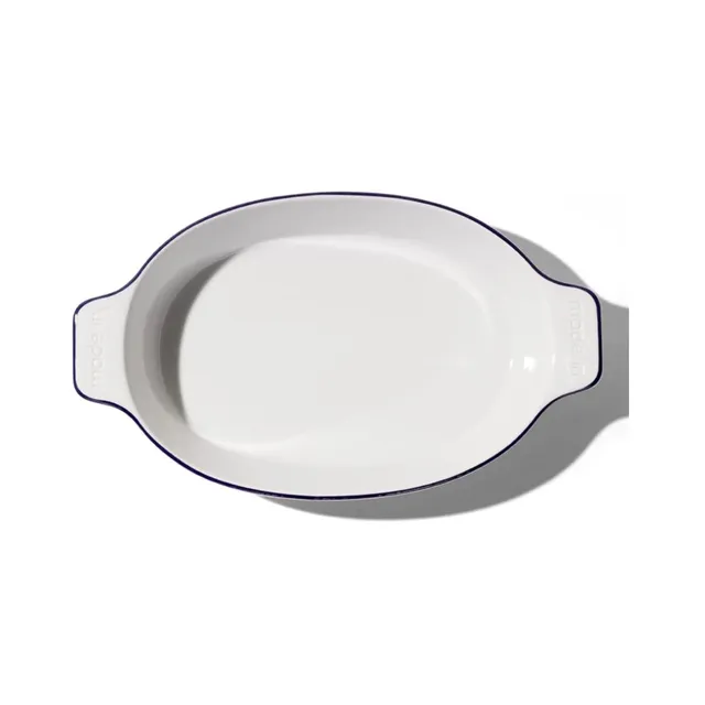 made-in-oval-baking-dish-navy-rim-handcrafted-french-porcelain-bakeware-10-bakin image 1