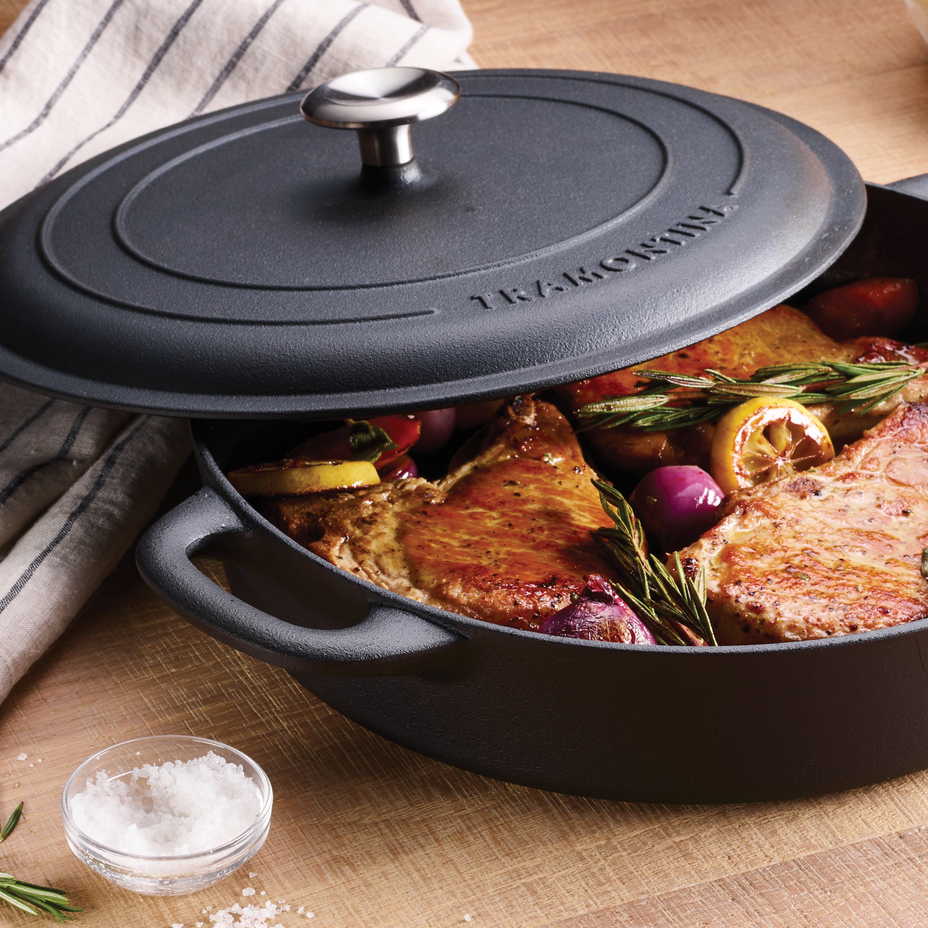 tramontina-12-5-inch-pre-seasoned-cast-iron-covered-skillet-with-self-basting-li image 5