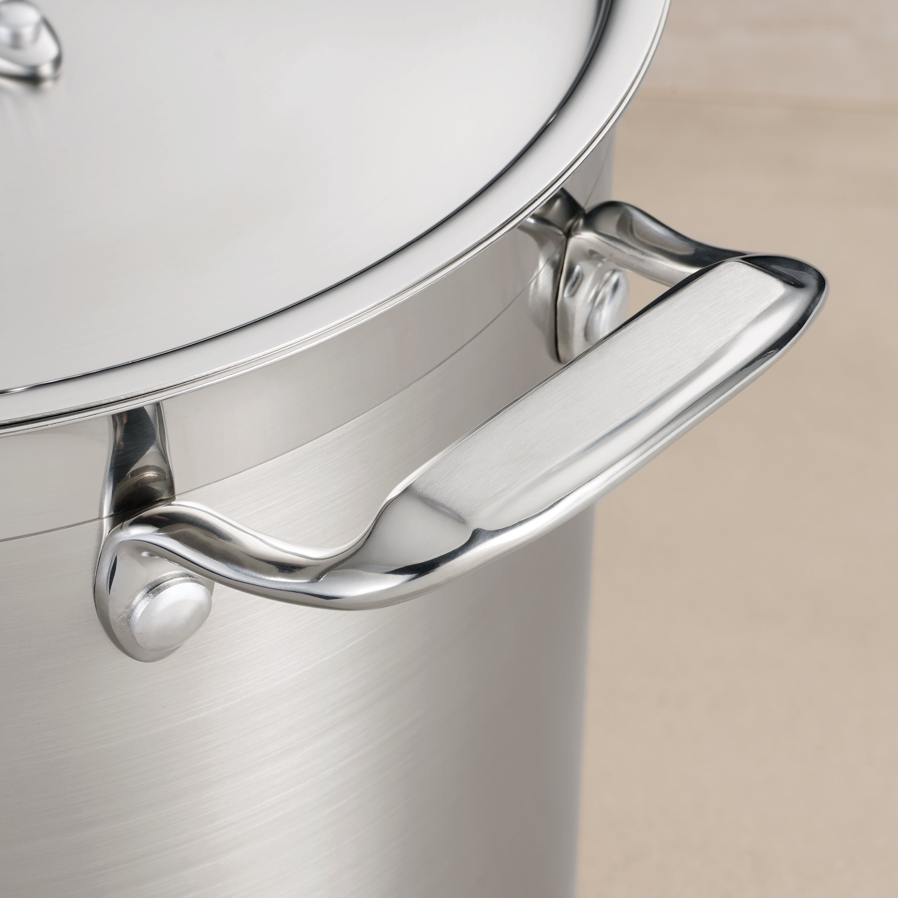 tramontina-gourmet-stainless-steel-covered-stock-pot-with-tri-ply-induction-base image 5