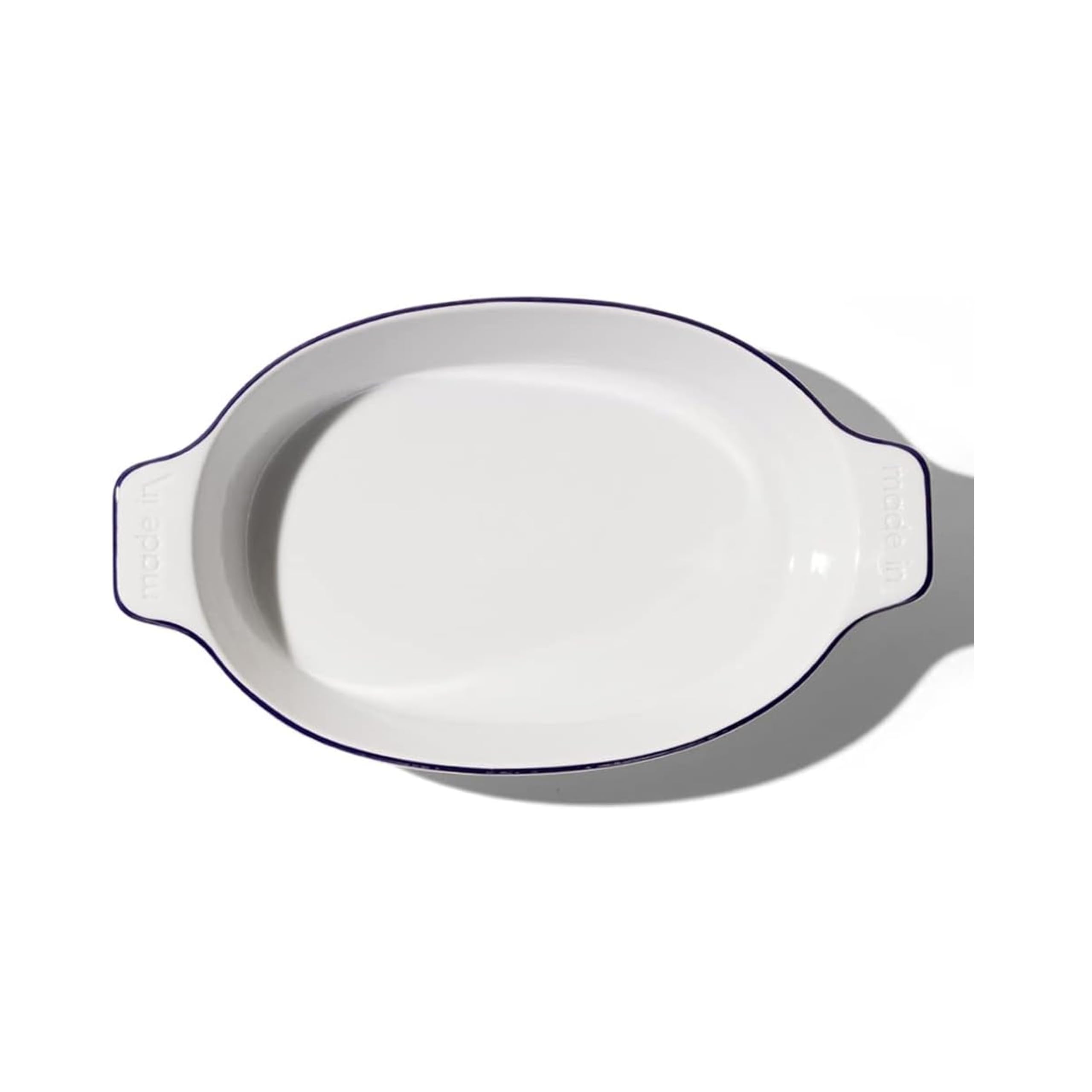 made-in-oval-baking-dish-navy-rim-handcrafted-french-porcelain-bakeware-10-bakin image 1