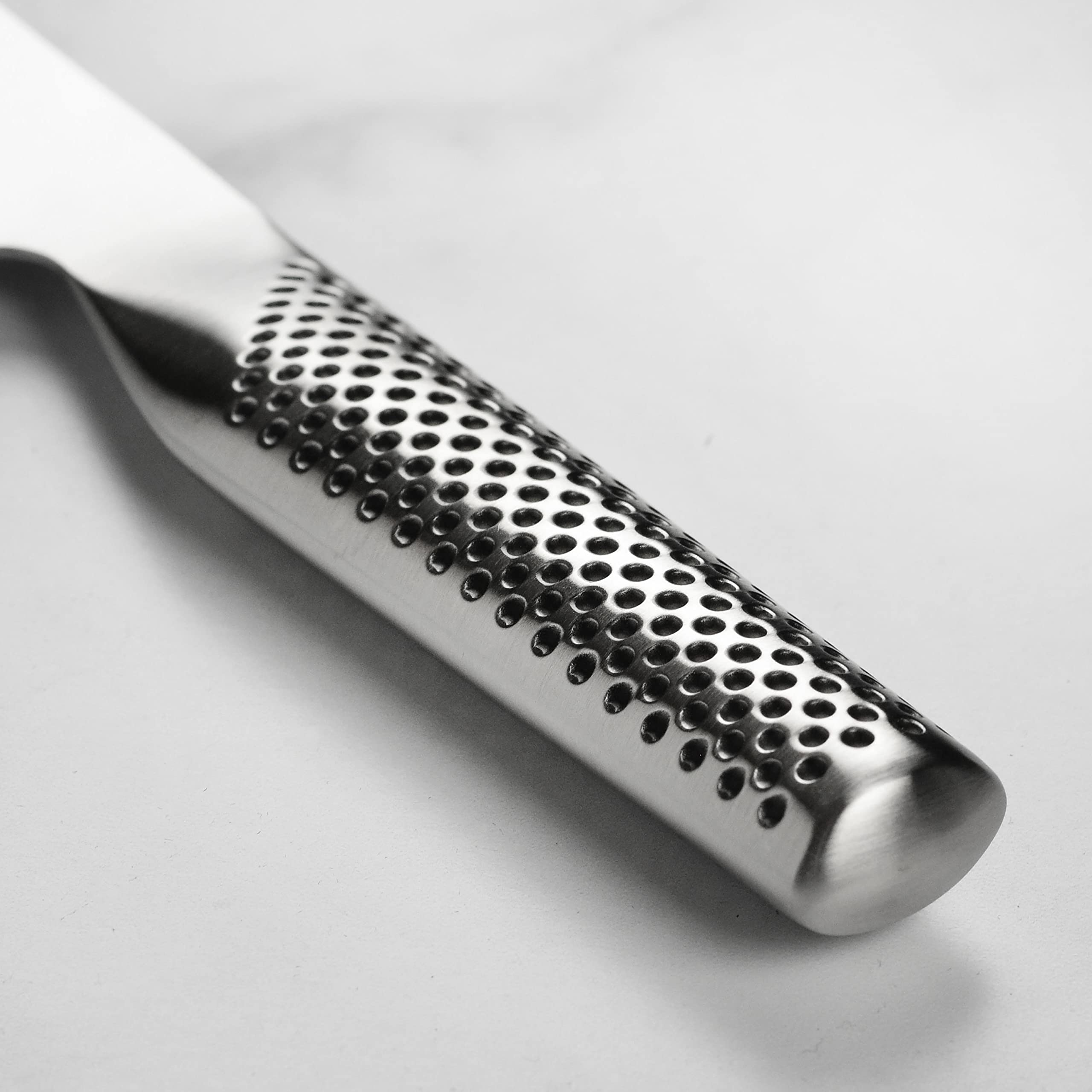 global-7-chef-s-knife-cromova-18-japanese-stainless-steel-dimpled-handle image 4