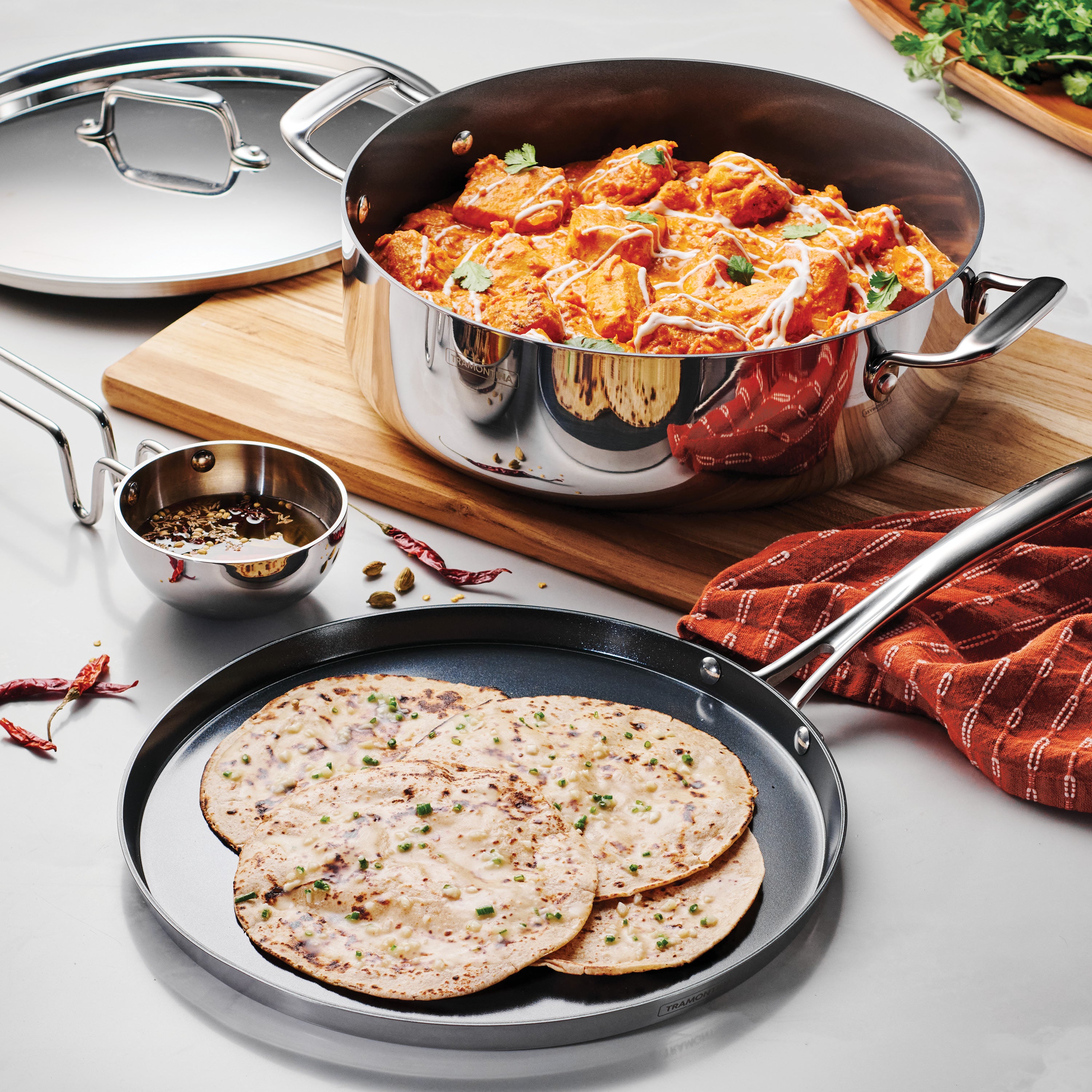 tramontina-6-5-quart-covered-stainless-steel-casserole-with-12-inch-dosa-tawa-ta image 2