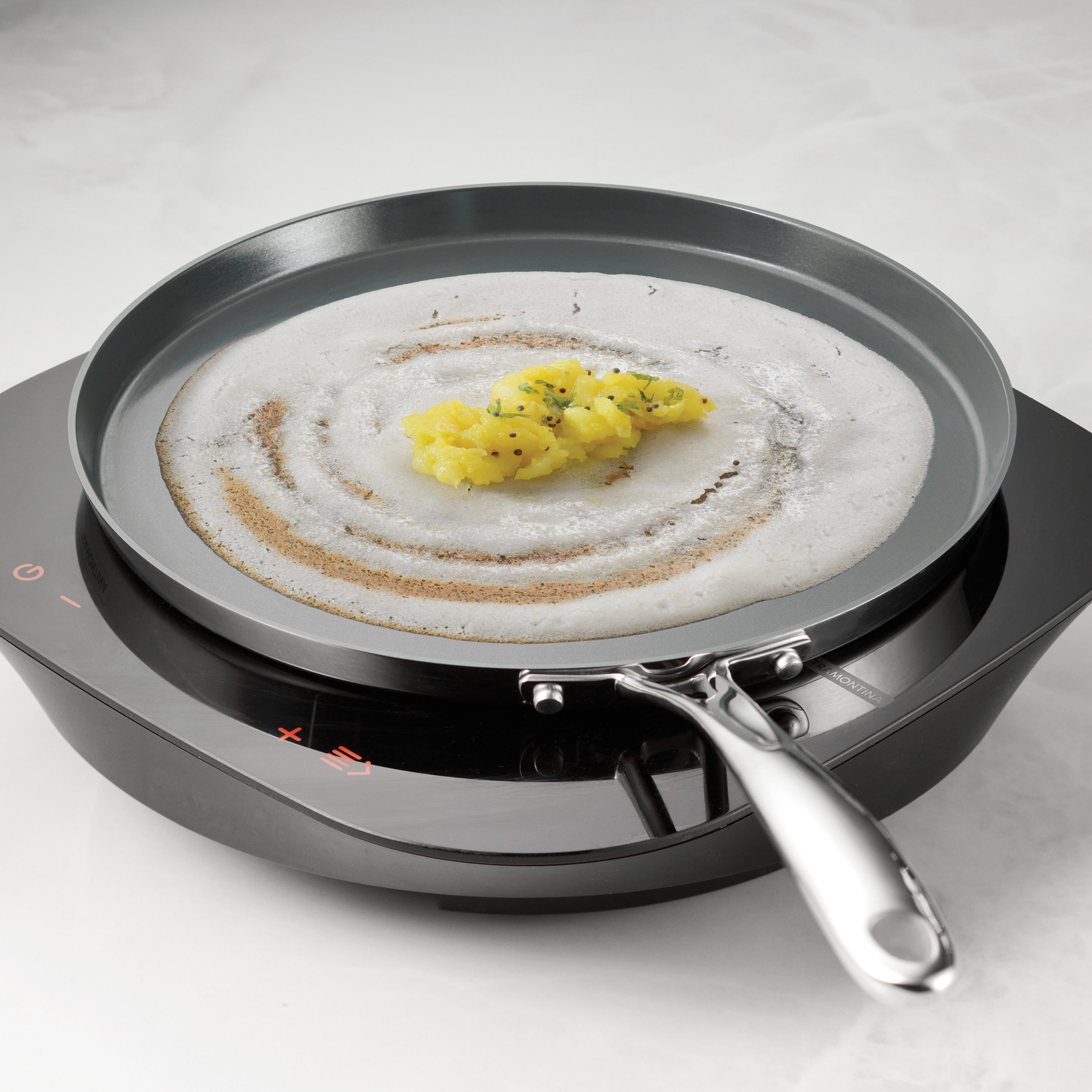 tramontina-6-5-quart-covered-stainless-steel-casserole-with-12-inch-dosa-tawa-ta image 7