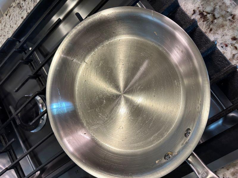 Good pan, learning curve with stainless