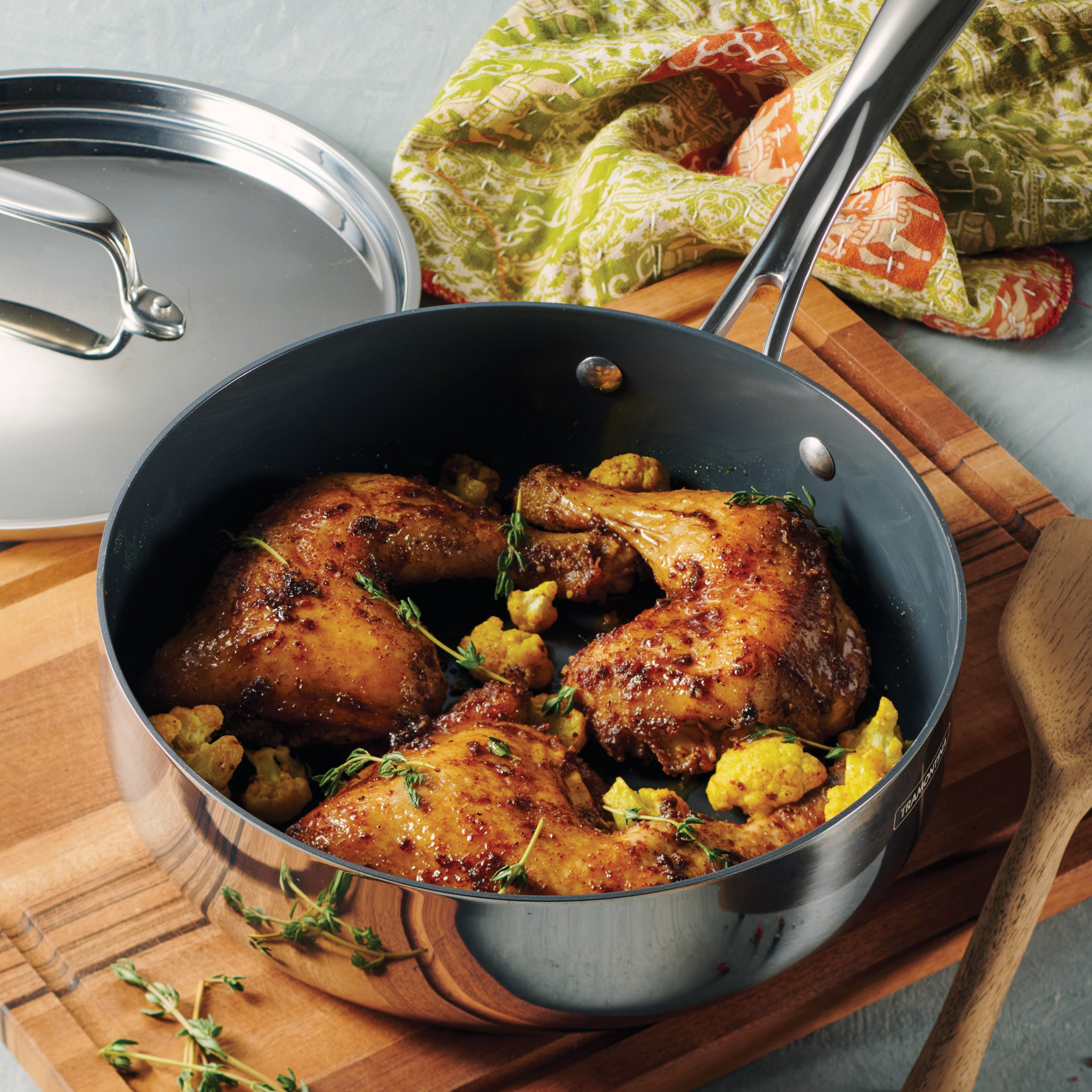 tramontina-utsava-tri-ply-clad-2-9-qt-covered-deep-saut-pan-with-ceramic-interio image 4
