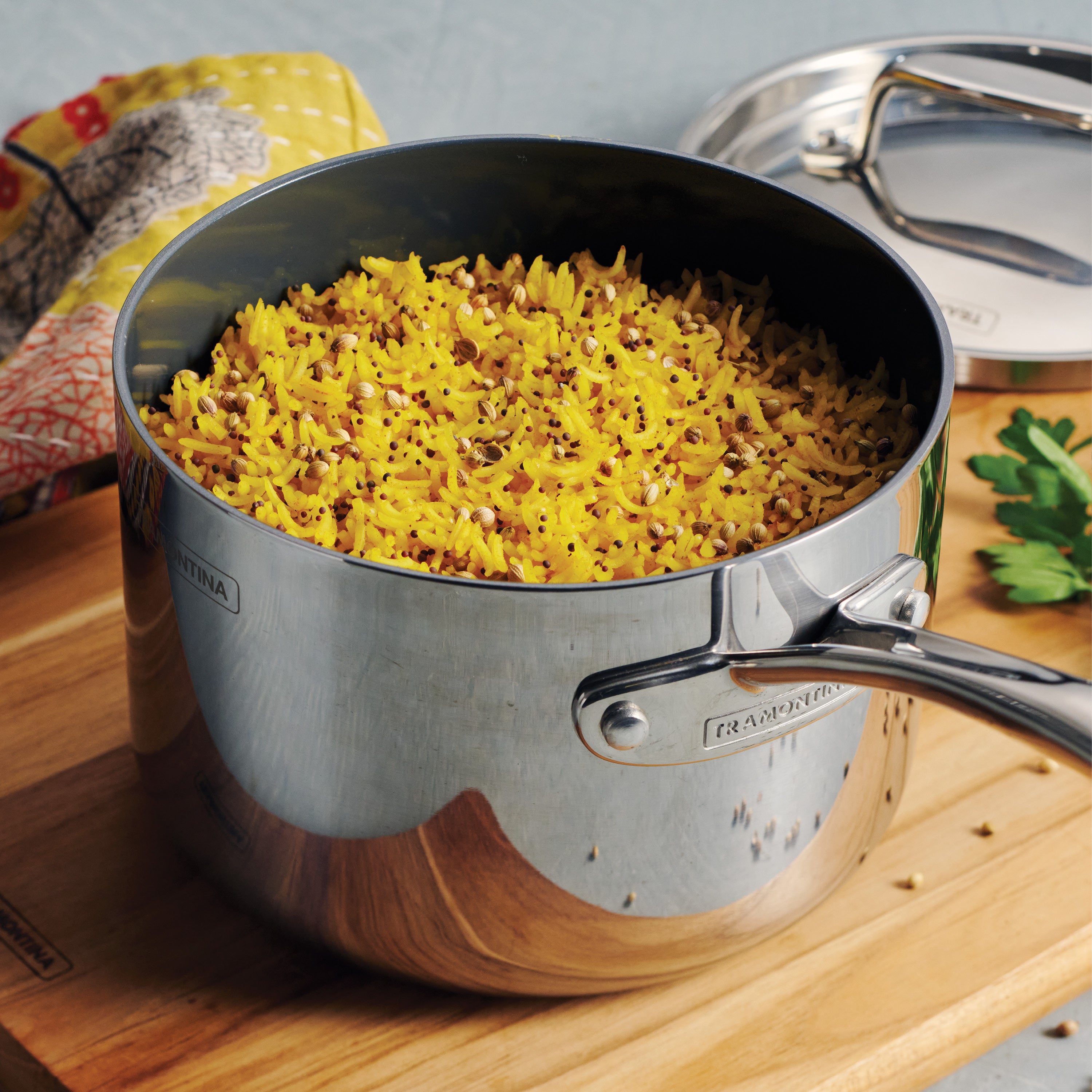 tramontina-utsava-tri-ply-clad-2-2-qt-covered-saucepan-with-ceramic-interior-ind image 4