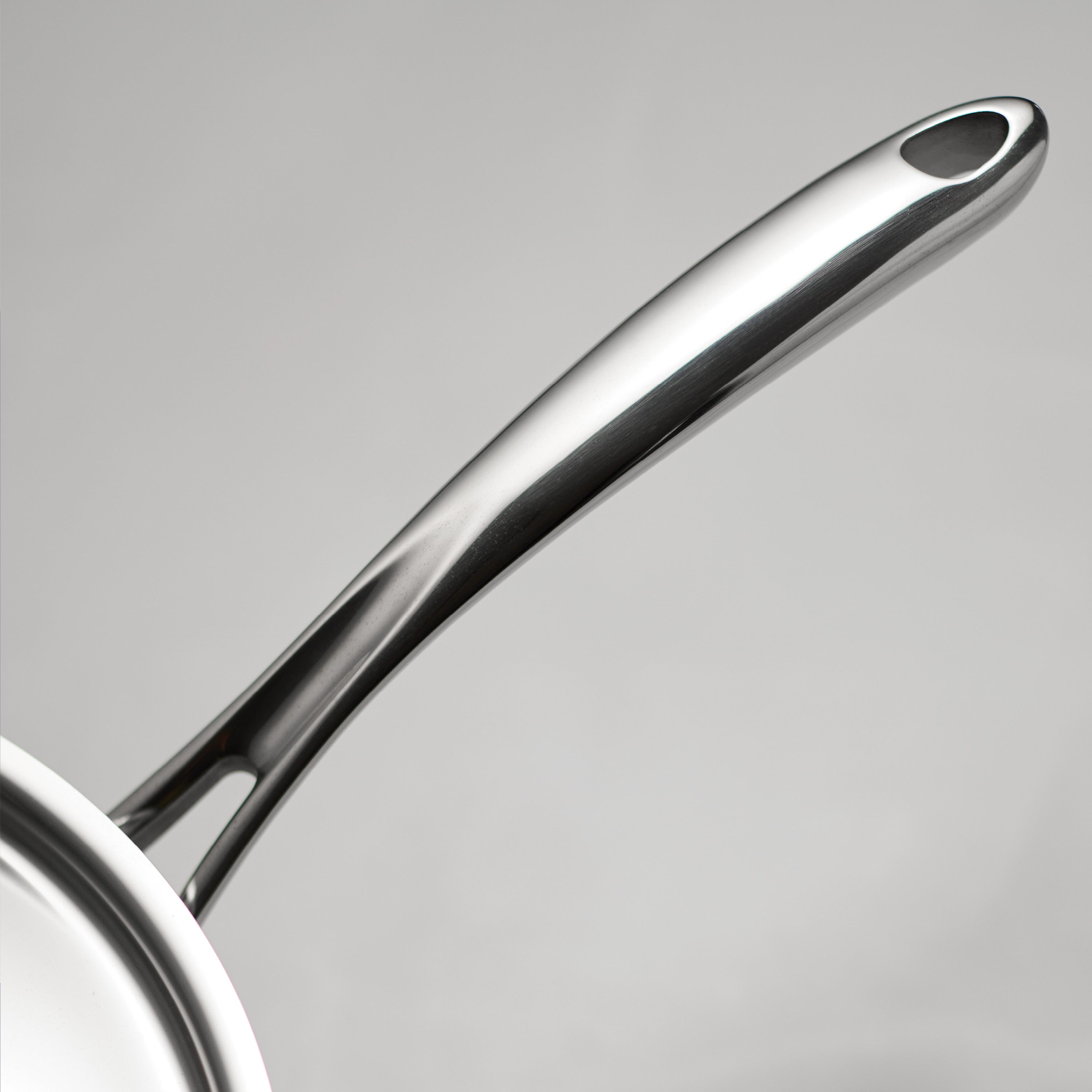 tramontina-utsava-tri-ply-clad-2-2-qt-covered-saucepan-with-ceramic-interior-ind image 7