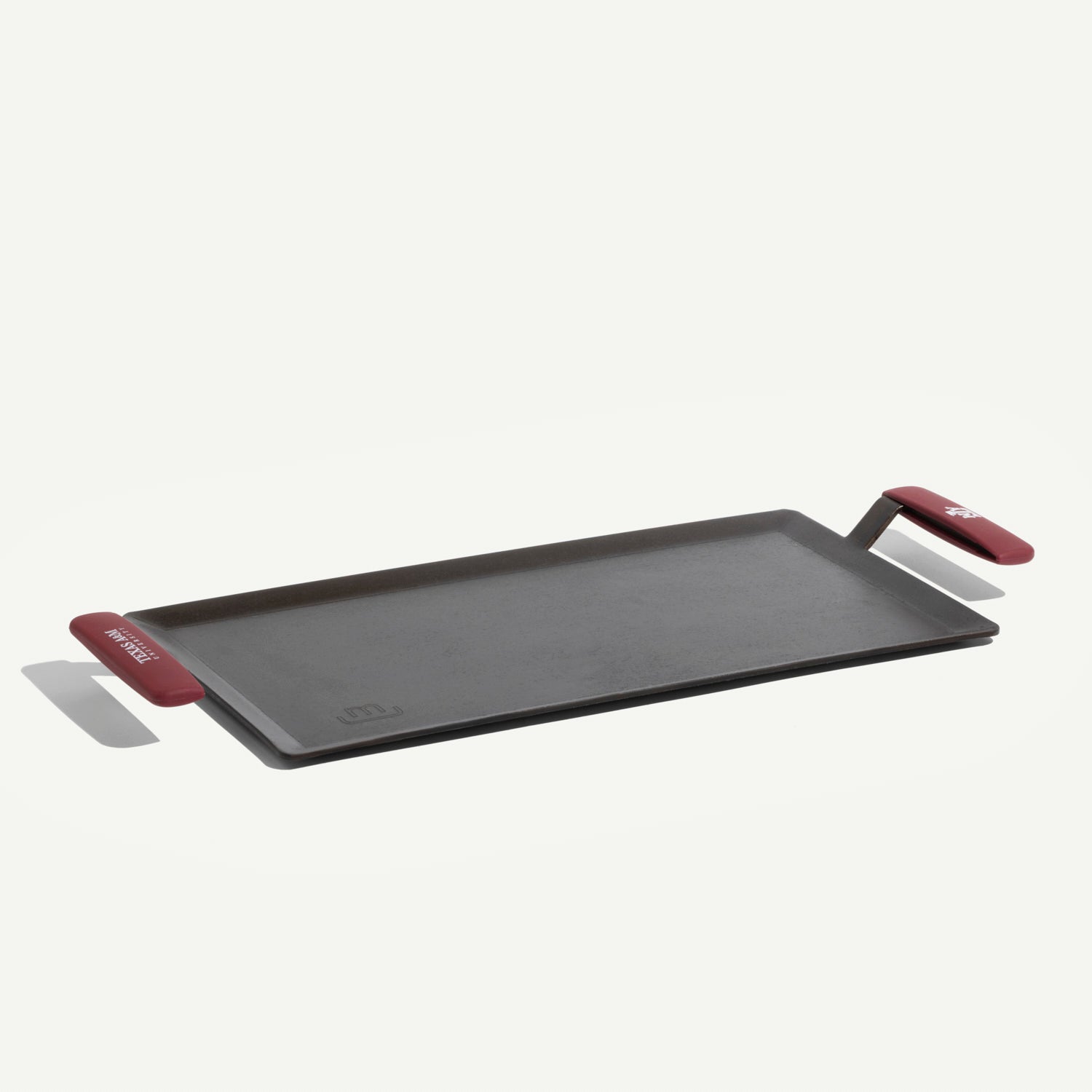 made-in-carbon-steel-griddle-with-texas-a-m-aggies-silicone-handle-sleeves image 1
