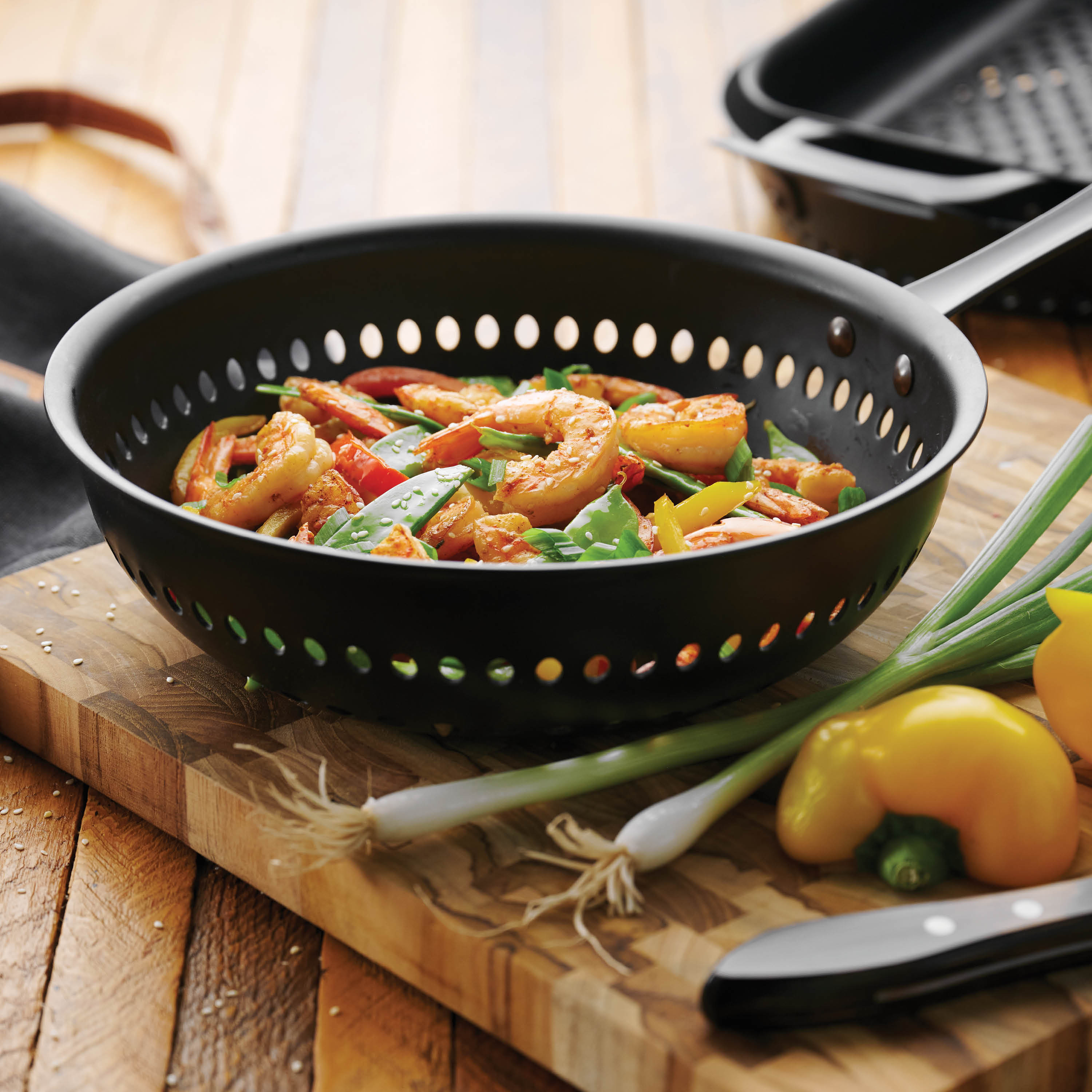 tramontina-churrasco-10-in-round-perforated-carbon-steel-stir-fry-pan image 3