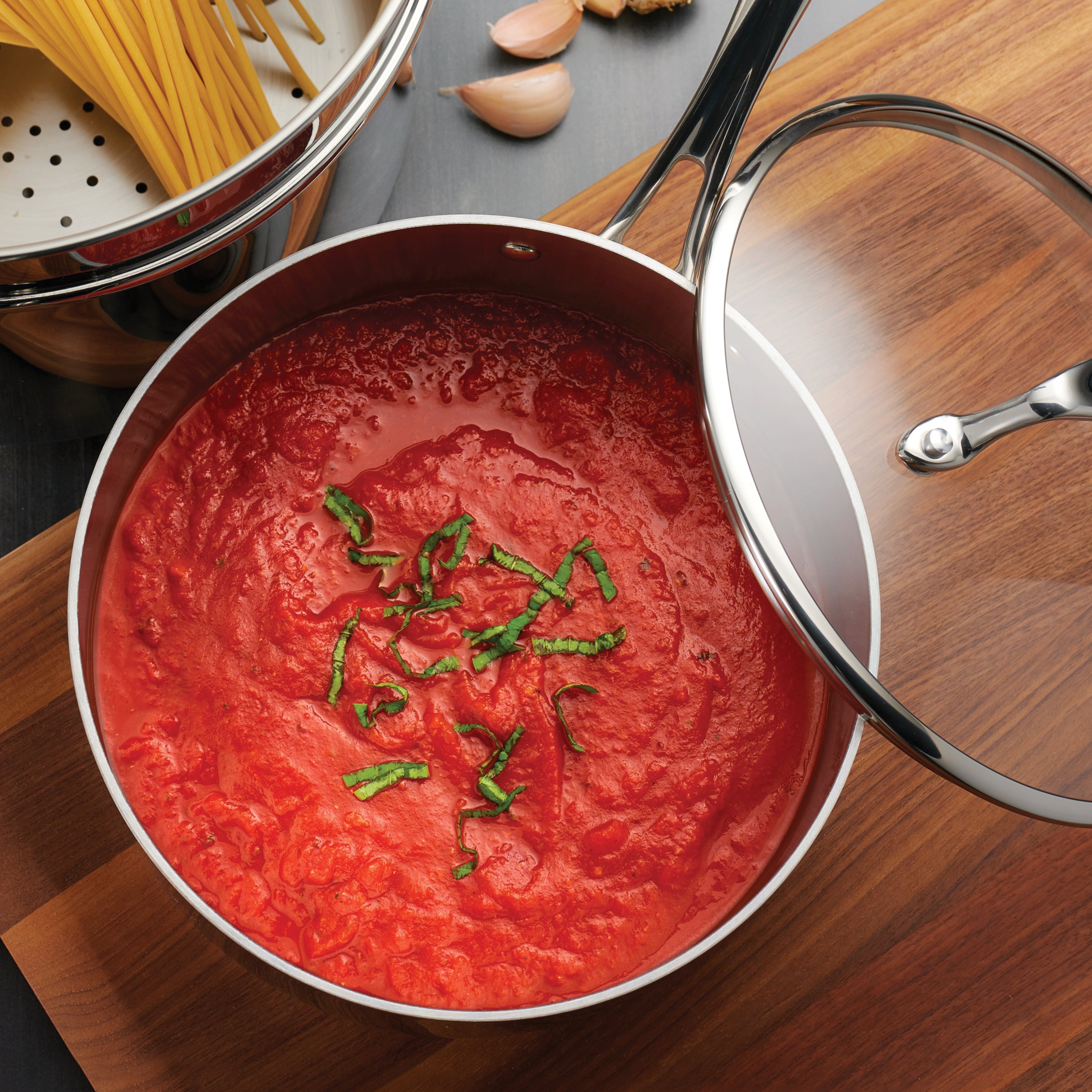 tramontina-tri-ply-clad-stainless-steel-covered-sauce-pan-with-glass-lid image 7
