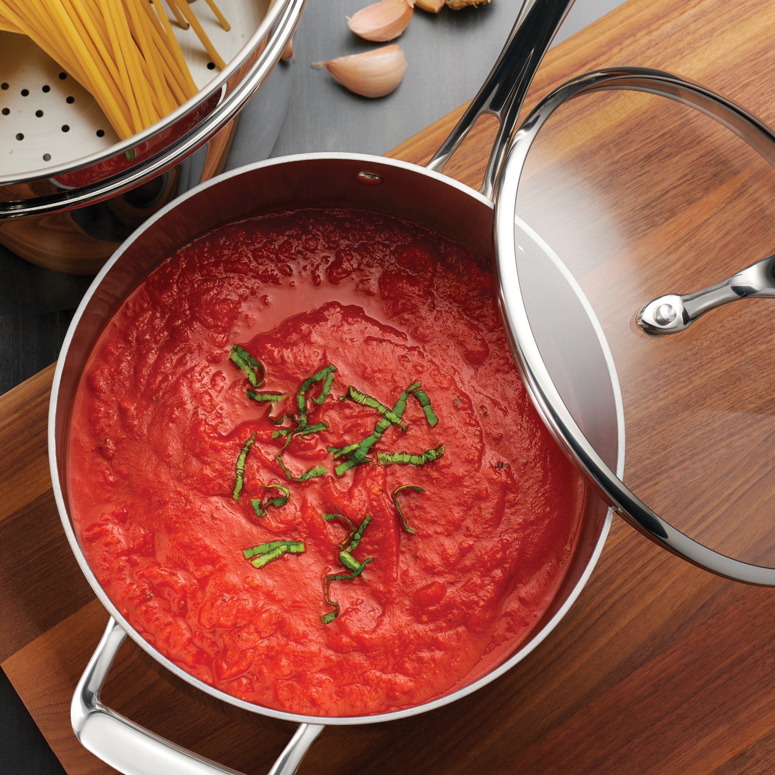 tramontina-tri-ply-clad-stainless-steel-covered-sauce-pan-with-glass-lid image 5