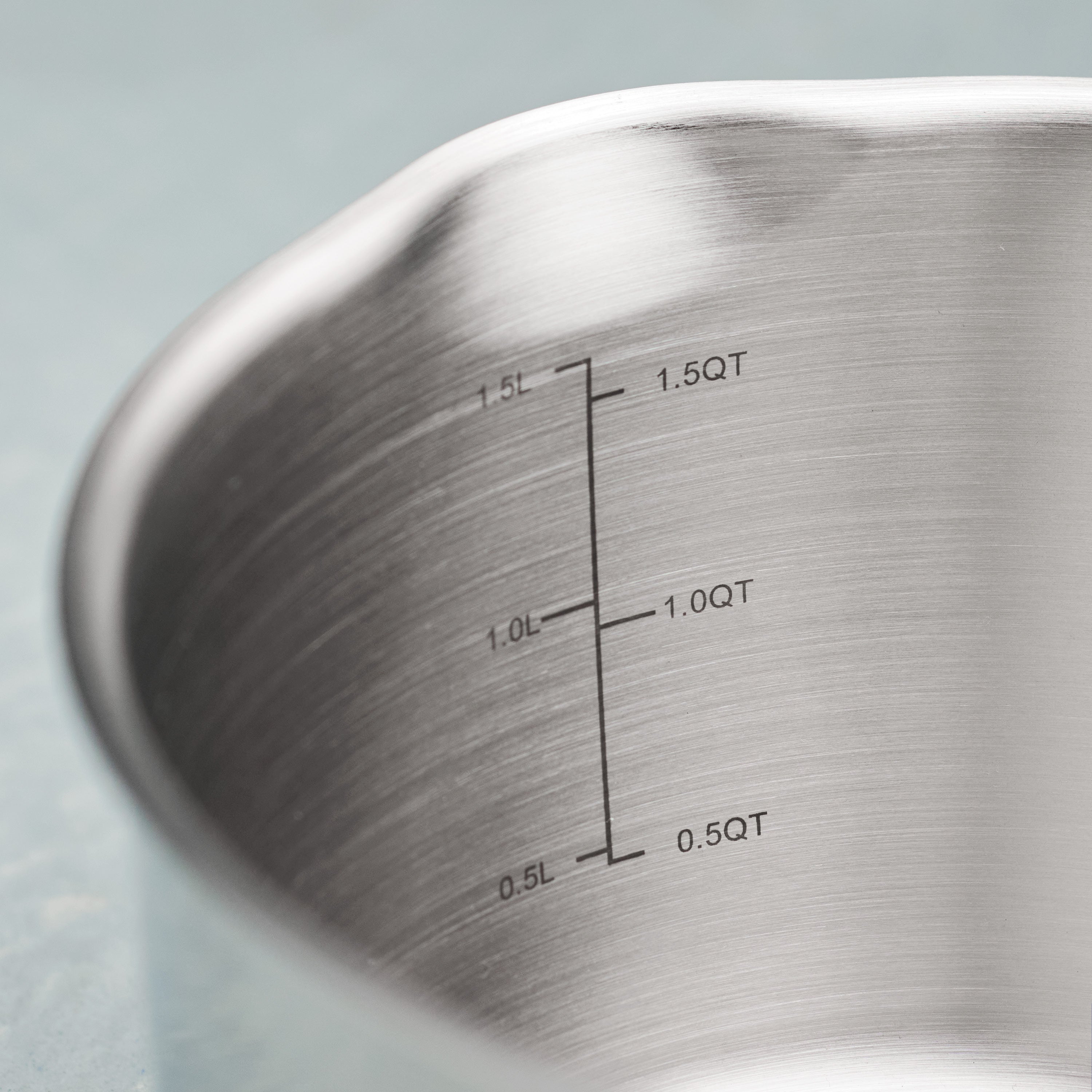 tramontina-tempo-tri-ply-base-stainless-steel-covered-saucepan image 2