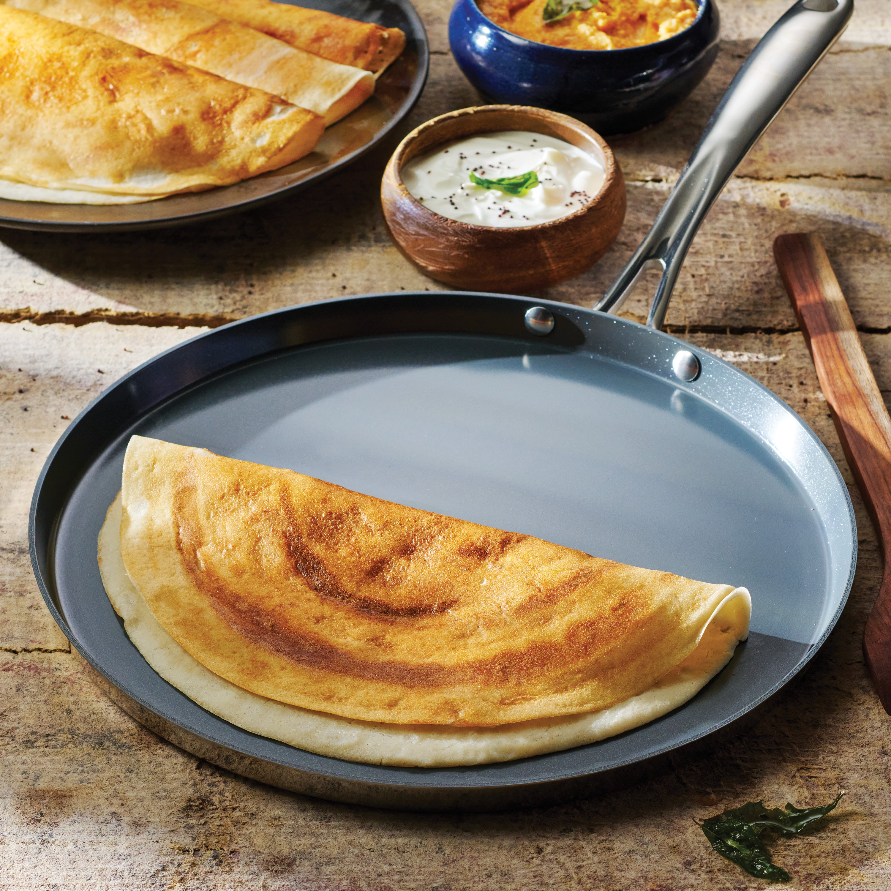 tramontina-utsava-tri-ply-clad-stainless-steel-ceramic-nonstick-dosa-tawa image 2